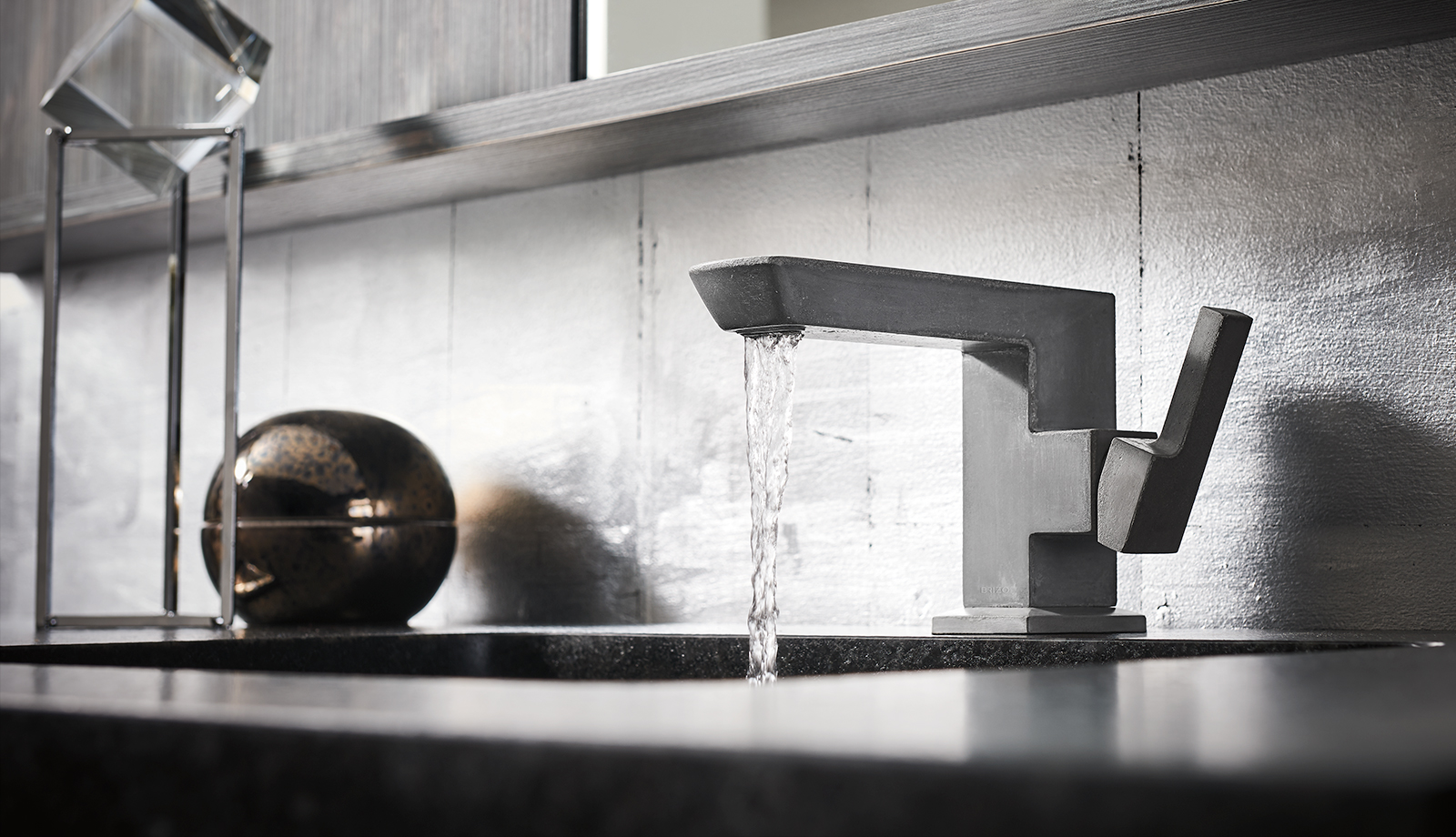 Modern sink faucet with running water (bathroom)